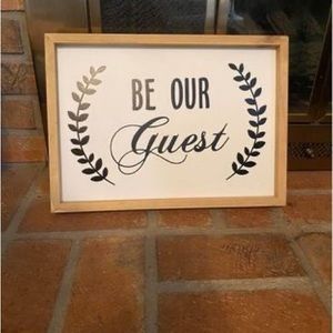 Be our guest sign
